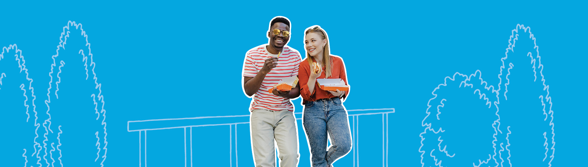 two friends eating takeout leaning onto arailing outside